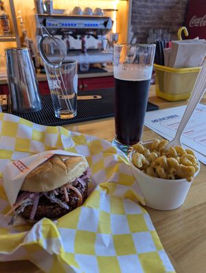 Kickn chicken sando, Mac n cheese, and a cold beer. LOVED the sando. The Mac had a solid creamy texture but the seasoning wasn't to my preference. Still a good side though. at Shahar in Louisville