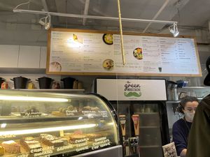 Dessert case and menu  at The Green Moustache - Lorimer Rd in Whistler