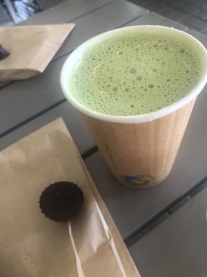 Matcha latte and dark chocolate cup  at The Green Moustache - Lorimer Rd in Whistler