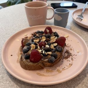 Almond spread toast with berries and maple syrup   at Melrose Kitchen Eaux-vives - The Health Corner in Geneva