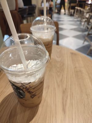 Cafe latte with vegan whipped cream at Starbucks - Napoli Galleria in Naples