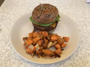 Their vegan double cheese burger with sweet potato hash  at True Food Kitchen - Fashion Valley Mall in San Diego