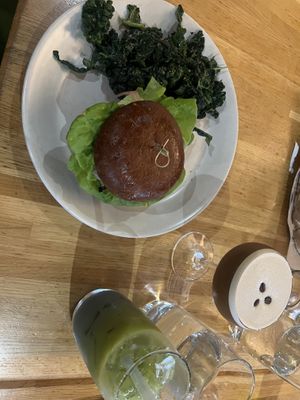 Vegan burger with kale saladd  at True Food Kitchen - Fashion Valley Mall in San Diego