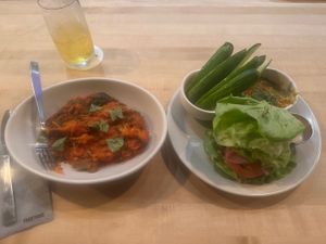 Squash Casserole / Double vegan burger with double lettuce wrap / Hummus and Cucumbers 🥒   at True Food Kitchen - Fashion Valley Mall in San Diego
