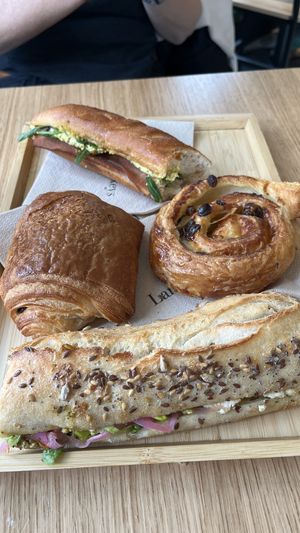 Two times sandwich mediteranéen, one pain au chocolat and a suisse  at Land & Monkeys - Les Halles in Paris