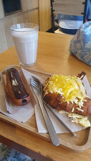 Chocolate eclair and croquet Monsieur croissant at Land & Monkeys - Les Halles in Paris