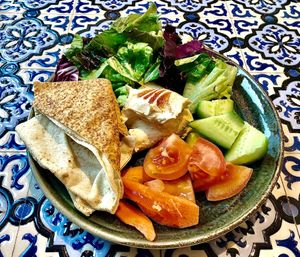 Hummus, salad and bread at Feta Restaurant in Dubai