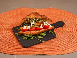 Croissant  con hamburger di ceci e patate,cicoria fritta,pomodoro e maionese vegan at Too Much - Brunch e Café in Lecce