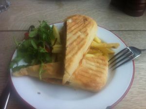 Vegan panini served with skin-on fries and house salad at The Cosy Club in Cardiff