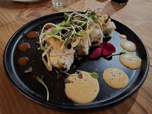 "The Village" smokey yam, okra, and lions mane roll at Village of OM in Sacramento