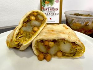 channa aloo roti wrap + spicy green beans (plated at home) at Pam's Kitchen in Seattle