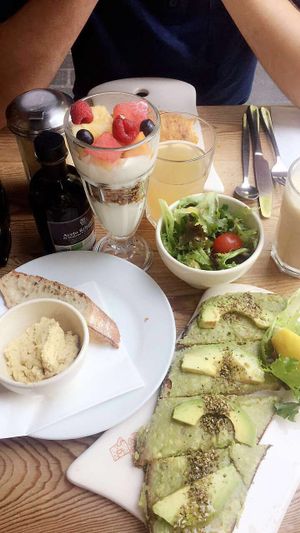 avocado toats, hummus and salad  at Le Pain Quotidien - Marais in Paris