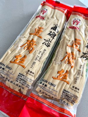 Tofu slices, so cute and yummy product! I fried it with veggies and served with noodles. at Alimentación Oriental in Lugones