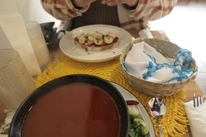 Cacao Amor Toast (top), handmade Tortillas (middle), menudo (bottom) at Abuelita Coco in Oak Lawn