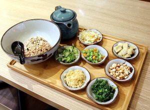 Lei cha in the pot comes with these small dishes.  at Simple Life - Jalan Sultan Ismail in Kuala Lumpur
