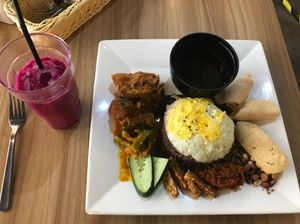 Nasi Lemak. Really tasty. Egg optional  at Simple Life - Jalan Sultan Ismail in Kuala Lumpur