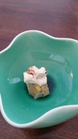 Corn pudding dessert with tofu cream, half-eaten at Salloga in Sapporo