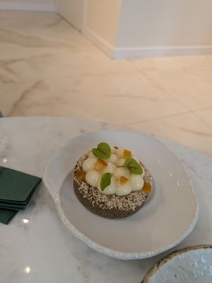 Hazelnut cream, cardamom, yuzu cream at Benevola in Barcelona