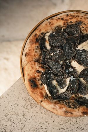 Truffle pizza Amazing  at TAAMA Restaurant in Dubai