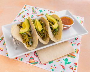 NATURAL CACTUS SALAD
Fresh, tender cactus tossed with crisp cilantro and onion, crowned with creamy avocado. Served with vibrant salsa on the side for the perfect refreshing bit at El Nopalito Vegan Taqueria - Food Stall in Fort Lauderdale