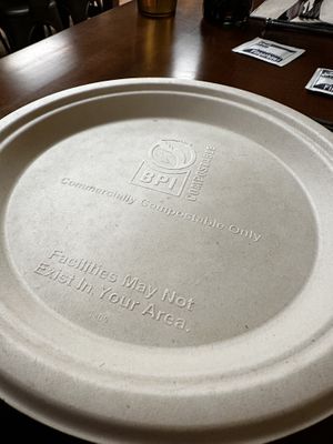 Recyclable plates  at Flour Girl & Flame in West Allis