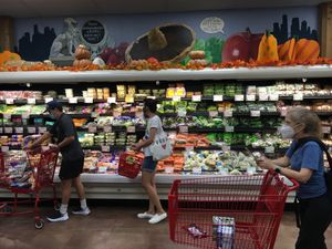 Produce--and long checkout line  at Trader Joe's - Broadway in New York City