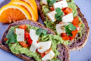 Smashed avo on toast with in house made plant based cheese at JUST BE Healthy Meals in Chicago