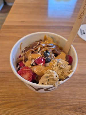 Delicious chocolate frozen yoghurt with blueberries, strawberries, cookie dough, chocolate sauce, coconut flakes, salted caramel sauce and lotus spread.   at Yo-Chi in Fremantle