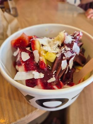 Açai, coconut frozen yoghurt, raspberry coulis, strawberries, pineapple and coconut flakes ❤️ at Yo-Chi in Fremantle