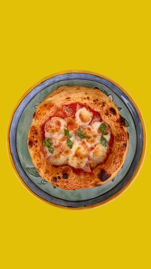 Pizza with pear and tomato sauce, can be vegan at San Pizzerino in Novi Sad