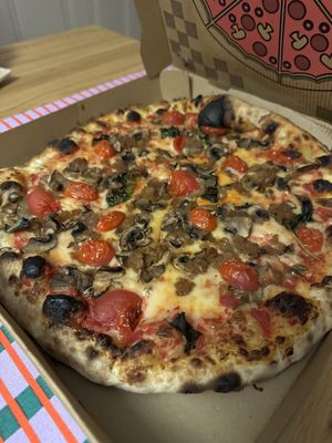 Earth crisis pizza with vegan cheese   at Black Magic Pizza in Orlando