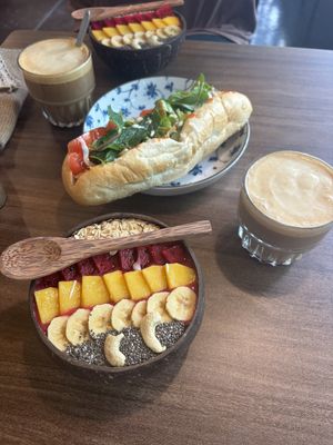 Smoothie bowl, banh mi and caramel coffee.  at An Vegan Restaurant in Lao Cai