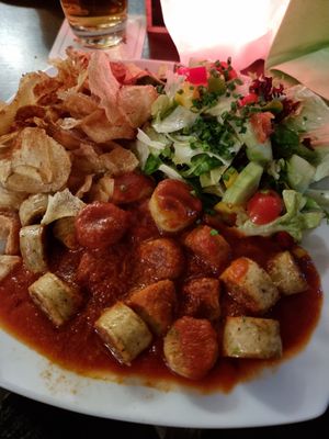 Tofu sausage with curry sauce at Grossstadt in Lindau