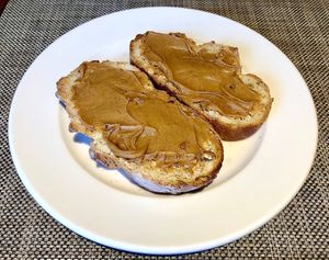 Sourdough toast with peanut butter  at Taybeh Restaurant in Aqaba