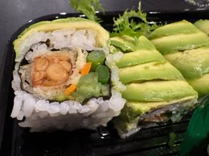 Roll: Tempura fried tempeh, asparagus, carrots, cucumber, topped with avocado and sweet chili mango sauce (I asked for no chili sauce on this one) at Zen Sushi in Asheville
