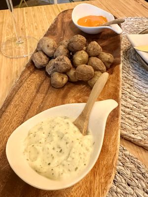 Granadillo - Canary black potatoes with smoked mojo and watercress aioli .  at Berro Bistrot in Gran Canaria