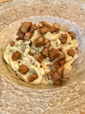 Mocán - pasta carbonara with smoked cashew cream, turmeric and kala namak.  at Berro Bistrot in Gran Canaria