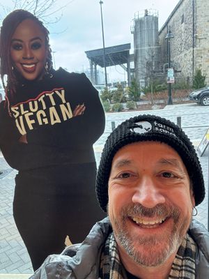 Posing with the cutout of Pinky. Officially sluttified! at Slutty Vegan in Baltimore