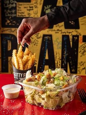 #SluttyCaesarSalad! Crispy Chik’N, Croutons, Vegan Parm & fresh lettuce. at Slutty Vegan in Baltimore