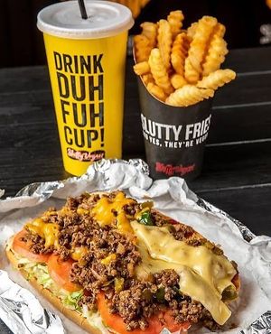 #HollyWoodHooker! SUPER VEGAN HOAGIE with fresh lettuce, tomatoes, jalapeños, grilled onions, mayo, ketchup & house chilli sauce. at Slutty Vegan in Baltimore