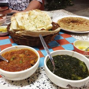garlic naan, aloo parotha, vegetables in sweet and sour sause S&S style, potato and spinach in spicy sause at S and S Indian Restaurant in Hua Hin