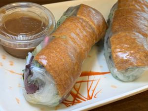 Vegan Roll:  Hand-Rolled Rice Paper w/ Seasoned Tofu, Fresh Herbs, Vegetables and Rice Noodles served w/ House-Made Peanut Dipping Dauce at Cravings Corners in Kalamazoo