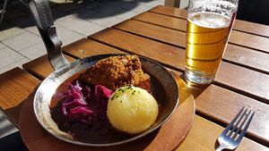 Bodhi Pfanderl with beer in the background. The "meat" has an amazing texture, not like those cutlets you are buying in the supermarket. Recommended! at Bodhi in Munich