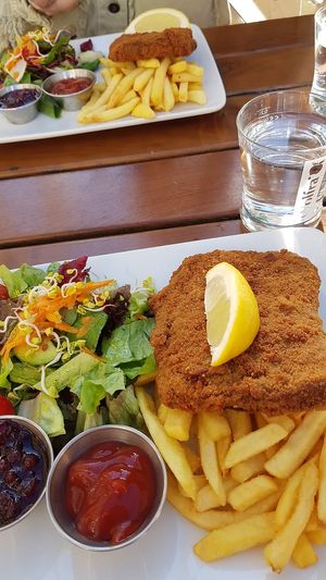 Schnitzel Wiener Art. So simple but so good! Love the dressing of the salad as well! at Bodhi in Munich