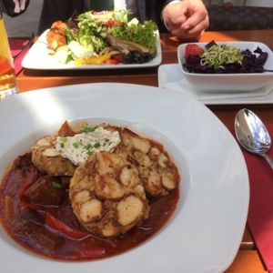 Saitangulasch with Breznknödel  - goulash made of saitan and pretzel dumplings at Bodhi in Munich