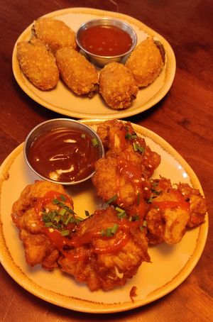 Buffalo wings and Chili „Cheeeze“-Nuggets at Bodhi in Munich
