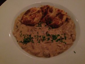 Creamy mushroom stew with pretzel dumplings and a side salad - so yummy! at Bodhi in Munich
