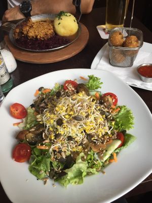Salad, Pfanderl and chili cheese nuggets   at Bodhi in Munich