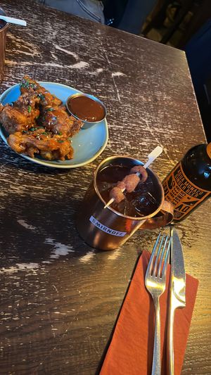 Buffalo wings and raspberry mule  at Bodhi in Munich