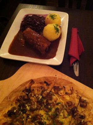 Roulade (background) and smoked tofu pflammkuchen (foreground) at Bodhi in Munich